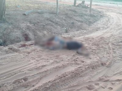 Corpo de vtima na esquina em que foi morta, em Coxim. (Foto: Edio:MS)