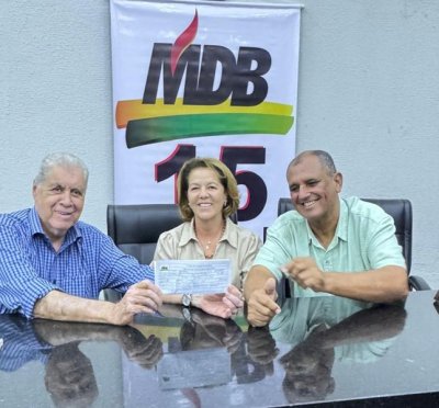 Andr� ao lado de Sandro e da esposa Rita